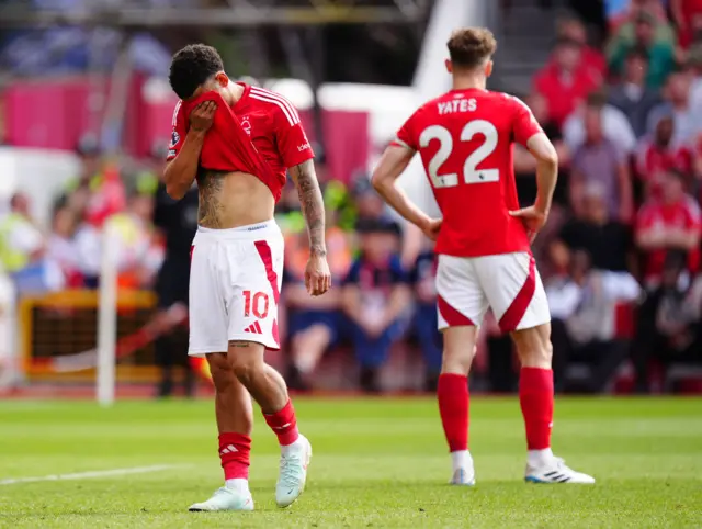 Nottingham Forest's Morgan Gibbs-White (left) and Ryan Yates appear dejected