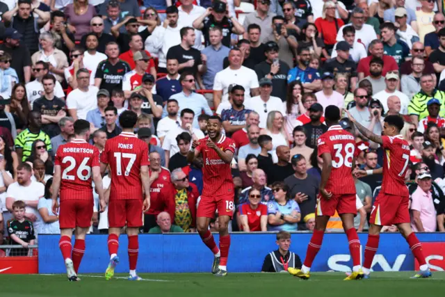 Gakpo celebrates scoring their first goal.