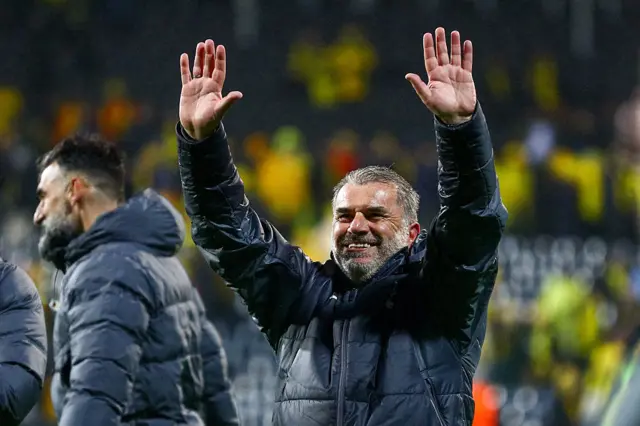 Ange Postecoglou waving to the Tottenham fans after winning away at Bodo/Glimt