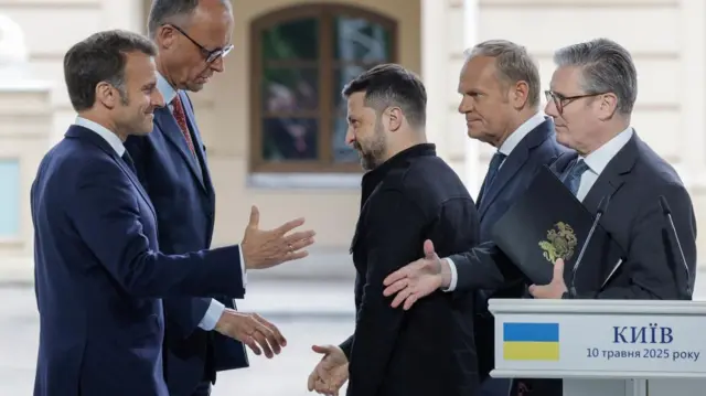 France's President Emmanuel Macron, Germany's Chancellor Friedrich Merz, Ukraine's President Volodymyr Zelensky, Poland's Prime Minister Donald Tusk and Britain's Prime Minister Keir Starmer react after a joint press conference