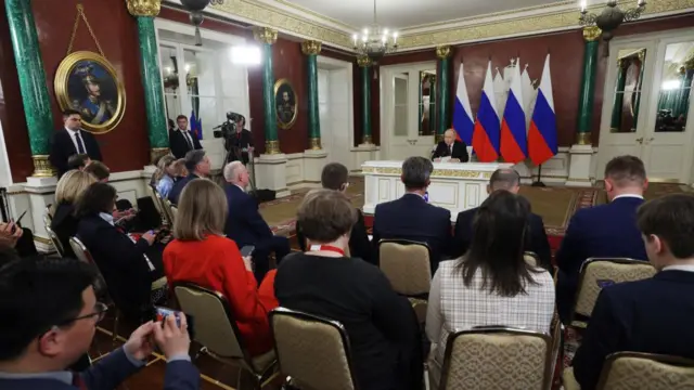 Russian President Vladimir Putin makes a statement to the media at the Kremlin in Moscow