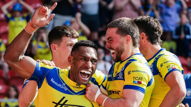 Rodrick Tai celebrates for Warrington