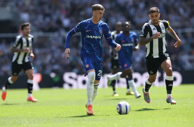 Cole Palmer of Chelsea (C) in action
