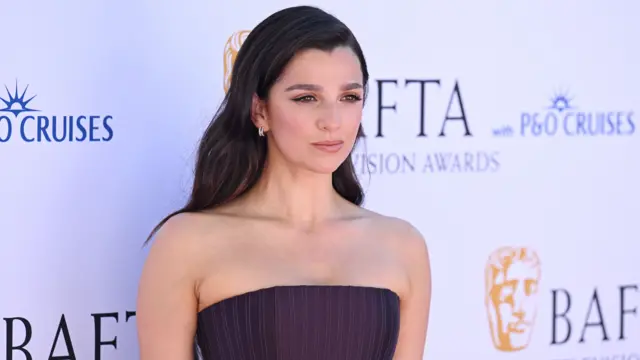 Marisa Abela posing on the red carpet