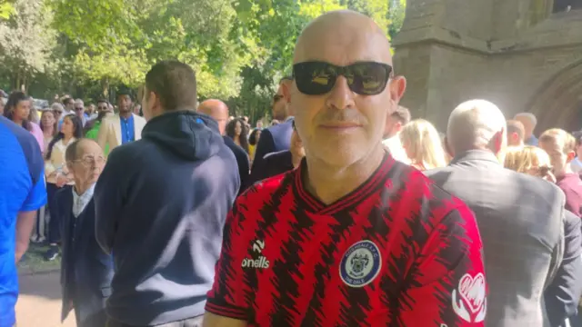 Rochdale fans gather at the funeral