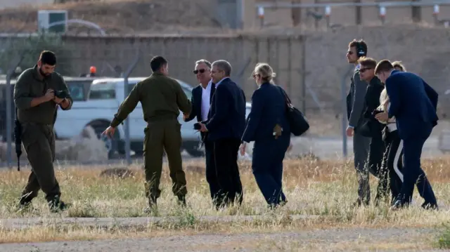 Steve Witkoff is greeted after disembarking the helicopter