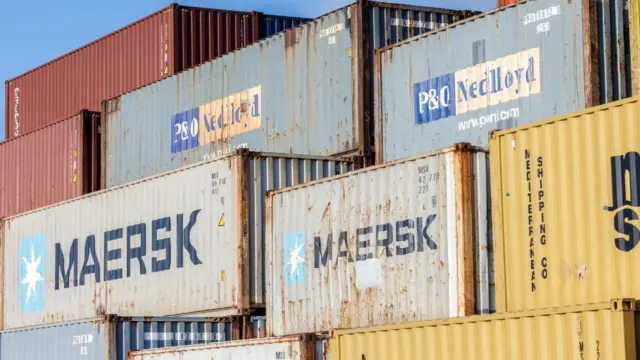 Shipping containers are stacked at a container terminal near the Miami International Airport in Miami, Florida, USA, 08 May 2025