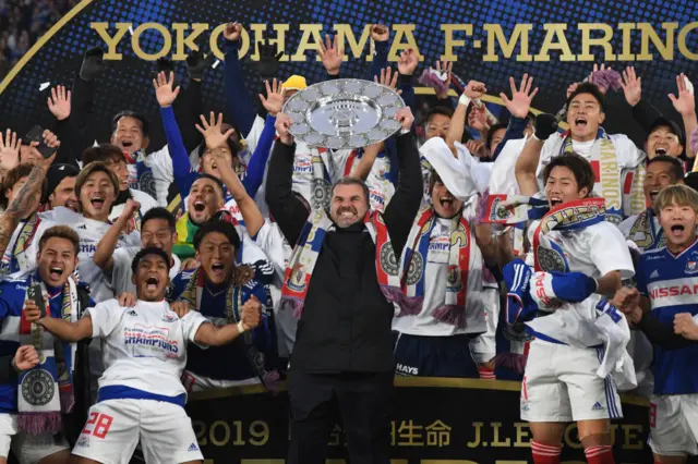 Ange Postecoglou lifts trophy