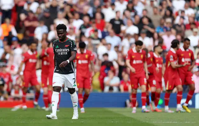 Bukayo Saka of Arsenal looks dejected