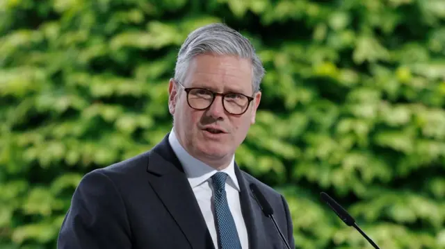 A file photo of Keir Starmer, standing in front of a microphone during a news conference