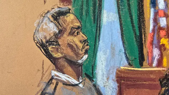 Prosecutor Emily Johnson points to Sean "Diddy" Combs at Combs' sex trafficking trial in New York City, New York, U.S., May 12,