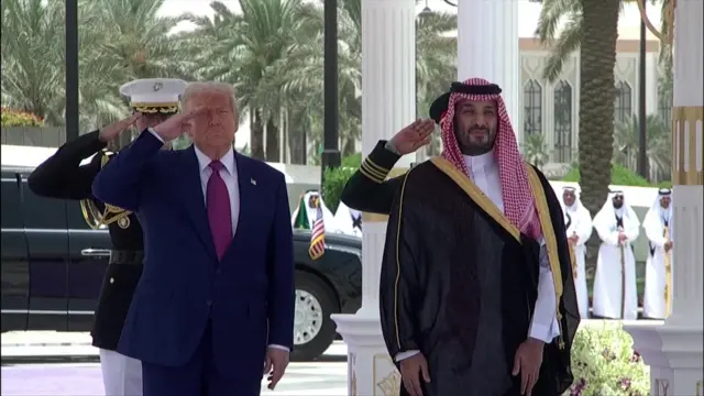 Trump salutes next to Crown Prince Mohammed bin Salman