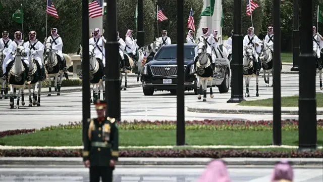 A convoy transporting the US President arrives at the Royal Court in Riyadh on May 13, 2025
