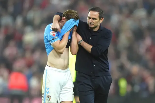 Coventry City head coach Frank Lampard (right) consoles player Jack Rudoni