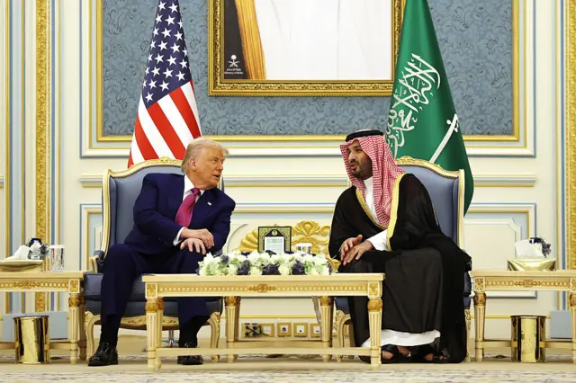 U.S. President Donald Trump walks with Saudi Crown Prince Mohammed bin Salman during an official state arrival ceremony at the Saudi Royal Court on May 13, 2025, in Riyadh, Saudi Arabia