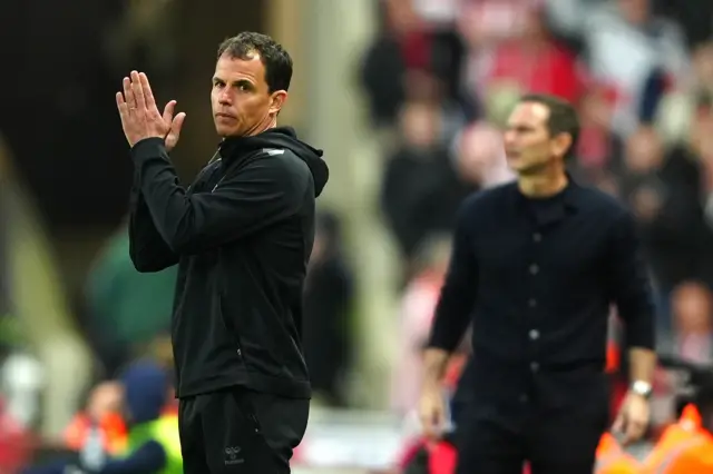 Sunderland manager Regis Le Bris (left) applaud the players as Coventry City head coach Frank Lampard looks on