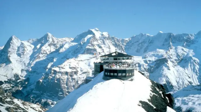 An aerial shot of the Schilthorn mountaintop restaurant, Piz Gloria, in Switzerland