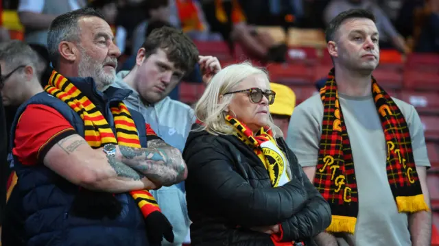 Thistle fans look dejected