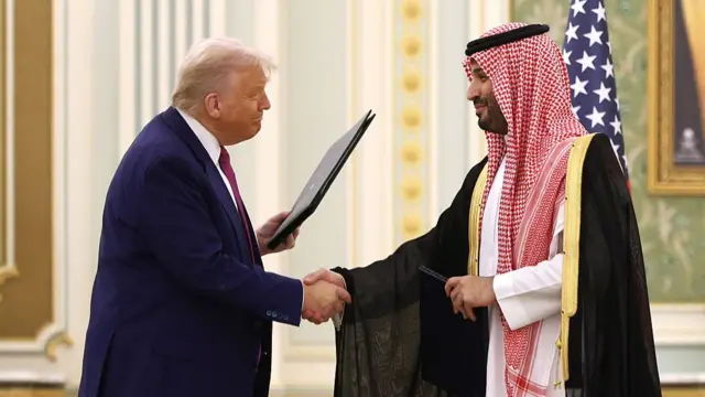 Trump and Mohammed bin Salman shake hands