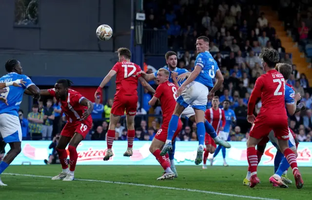 Stockport County's Fraser Horsfall heads wide