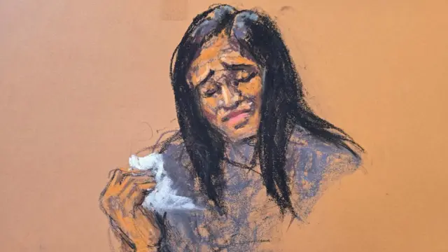 A court sketch shows Cassie Ventura as she holds a tissue