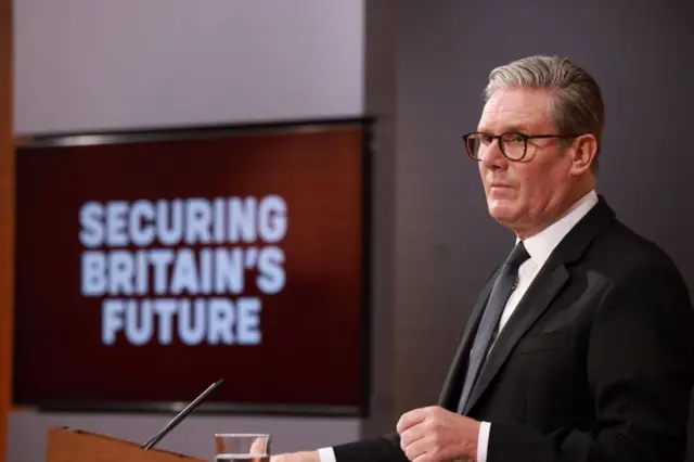 Prime Minister Sir Keir Starmer speaking during a press conference on the Immigration White Paper in the Downing Street Briefing Room in London, in front of a sign which says 'securing Britain's future'