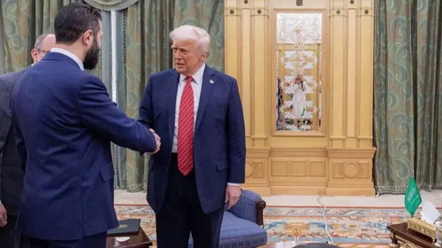Trump shakes hand of Sharaa