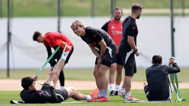 Rasmus Hojlund laughs during training