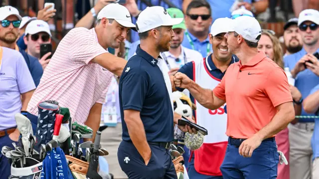 Rory McIlroy, Scottie Scheffler and Xander Schauffele chat at Pinehurst in 2024