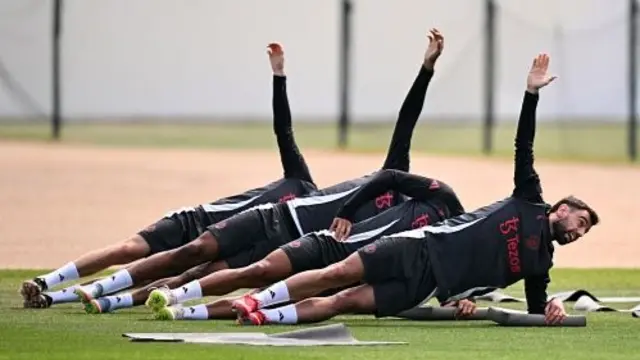 Bruno Fernandes stretches during a Manchester United training session