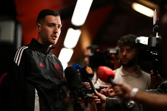 Diogo Dalot speaks to the press