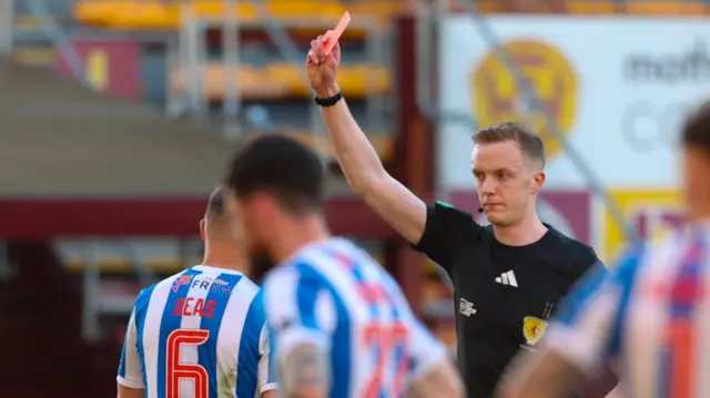 Kilmarnock's Robbie Deas is shown a red card by referee Duncan Nicolson following a VAR check during a William Hill Premiership match between Motherwell and Kilmarnock at Fir Park