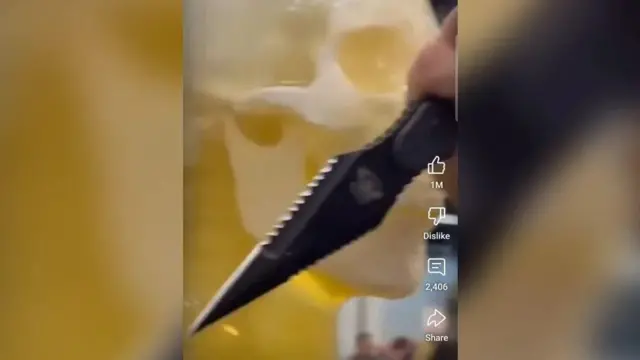 A tiktok screengrab of a zombie knife on a yellow background