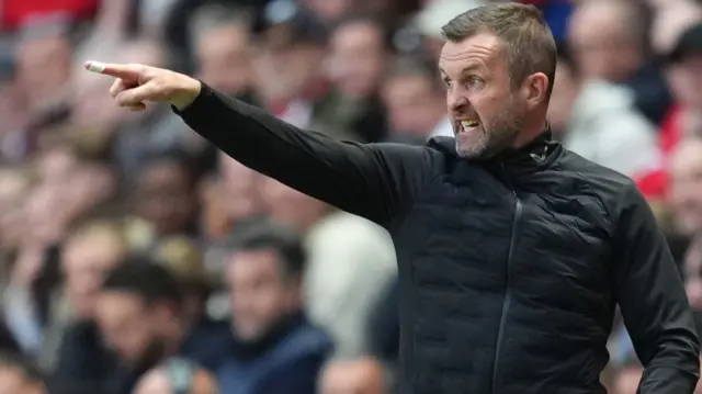 Nathan Jones pointing