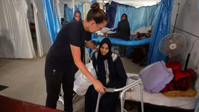 Paula Tobin with a patient
