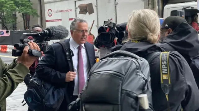 Marc Agnifilo arrives at court