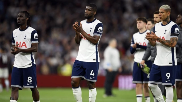 Tottenham Hotspur's Richarlison, Tottenham Hotspur's Yves Bissouma and Tottenham Hotspur's Kevin Danso look dejected