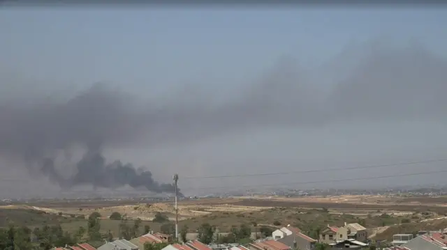 Smoke billows as seen from southern Israel towards the Israel-Gaza border