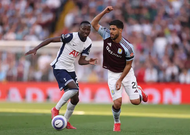 Marco Asensio of Aston Villa runs ahead of Pape Matar Sarr