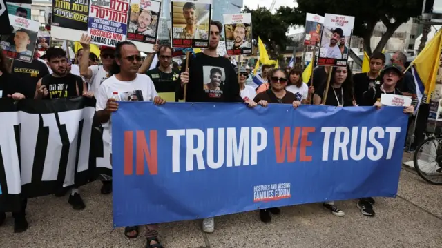 Families of Israeli hostages held by Hamas in Gaza and their supporters march outside the Kirya military base in Tel Aviv, Israel