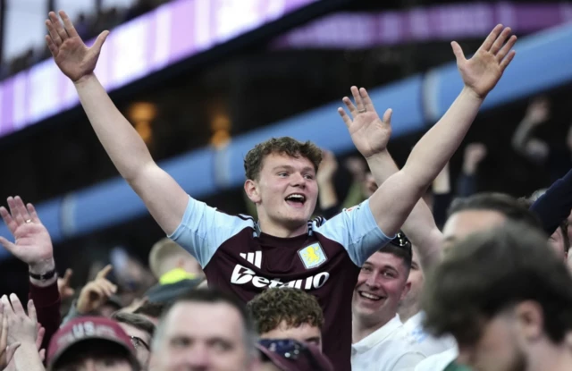 Aston Villa fan celebrates