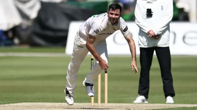 Leicestershire's Ian Holland bowling against Middlesex