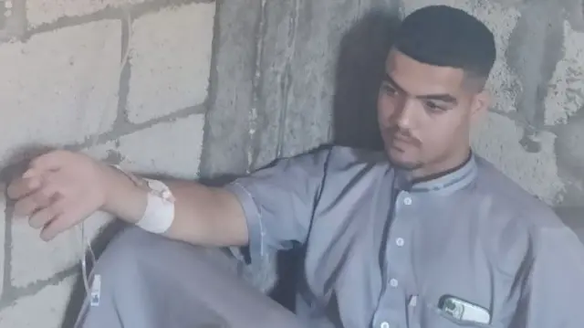 Abdel Rahman with an IV drip in his arm