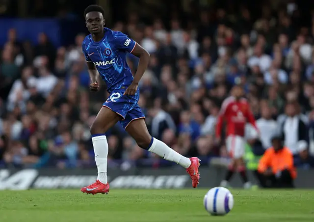 Tyrique George of Chelsea looks on