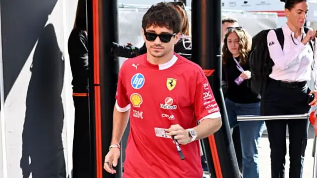 Charles Leclerc arrives in the Imola paddock