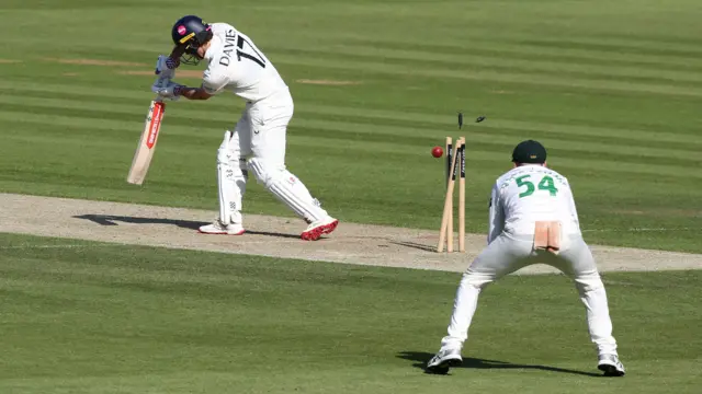 Jack Davies is bowled by Ben Green