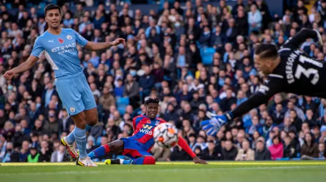 Wilfried Zaha scores against Manchester City
