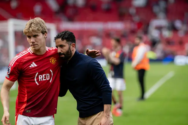 Rasmus Hojlund of Manchester United applauds the fans alongside Ruben Amorim