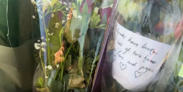 Messages left on flowers left by well wishers