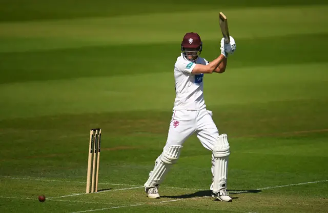 Archie Vaughan hits a cut for four for Somerset against Sussex